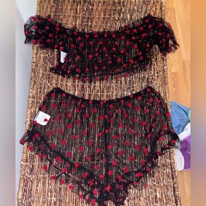 Cute lingerie piece. Sheer and super adorable!